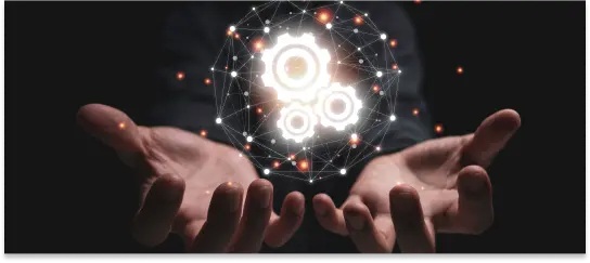 Infographic representing Hands holding a glowing network of interconnected gears.